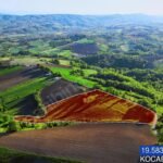 BAĞLICA’DA K.M.O. GİŞELERE YAKIN RESMİ YOLA CEPHE 19.583m2 TARLA - Fotoğraf 2